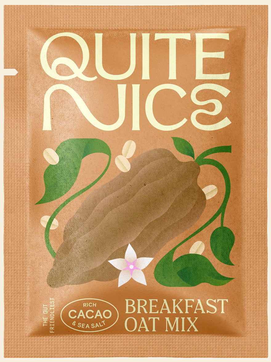 A brown packet labeled Quite Nice Breakfast Oat Mix features a large cacao pod illustration with green leaves and a small white flower. Text reads The Gut Friendly Test, highlighting real food ingredients with rich cacao & sea salt for improved gut health.